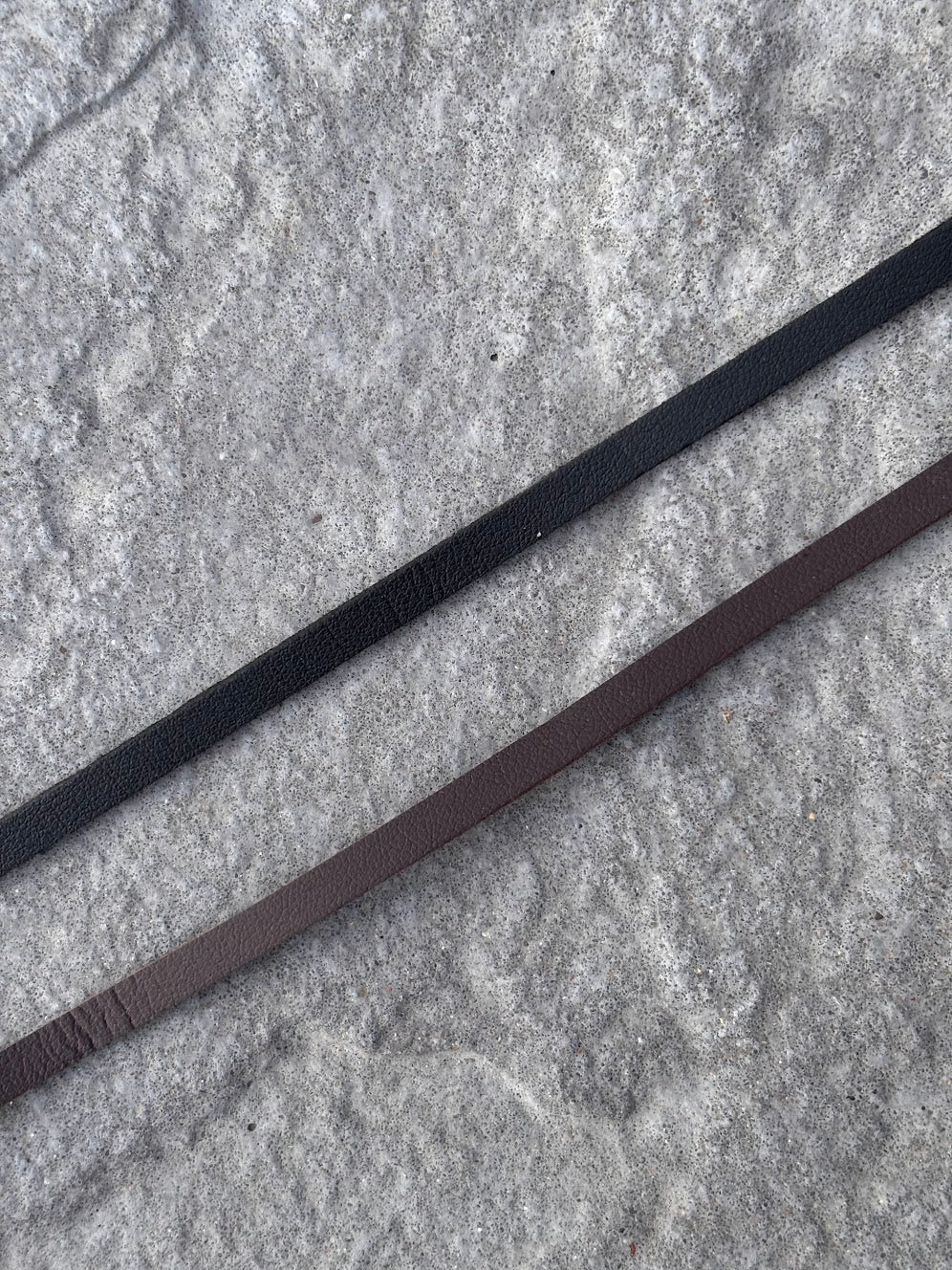Brown and black leather straps